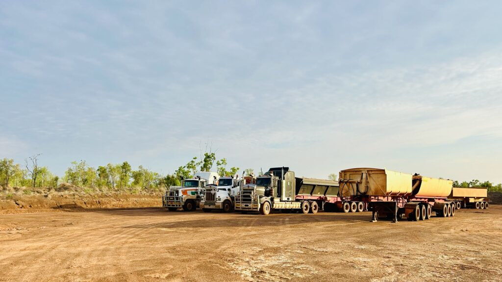 Walkabout Civil Doomadgee - 3 trucks lined up on dirt road