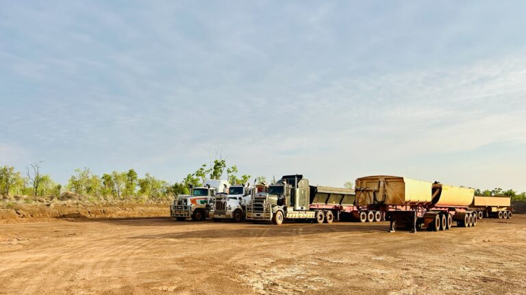 Walkabout Civil Doomadgee - 3 trucks lined up on dirt road