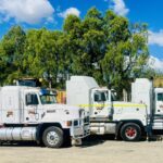 Walkabout Civil mack trucks lined up