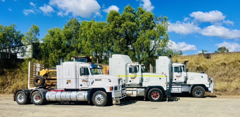 Walkabout Civil mack trucks lined up